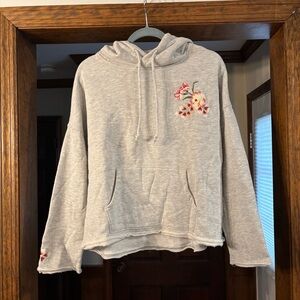 NWOT. Betsey Johnson Gray hoodie with embroidered floral detail. Size XS